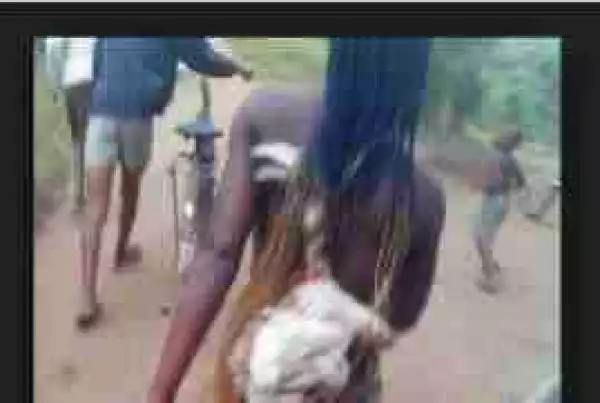 Caught Stealing Chicken, Beaten And Stripped With The Chicken Tied On Her Back (See Photos)